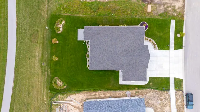 a brick building with a yard