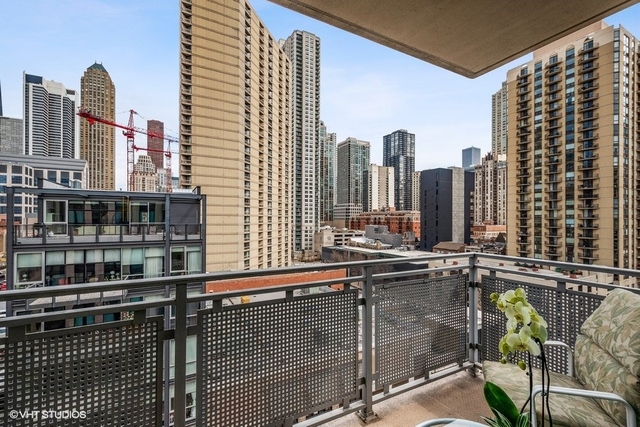 744 North Clark Street, Unit 801 Chicago, IL 60654 - Photo 11 of 12 a view of balcony with outdoor seating