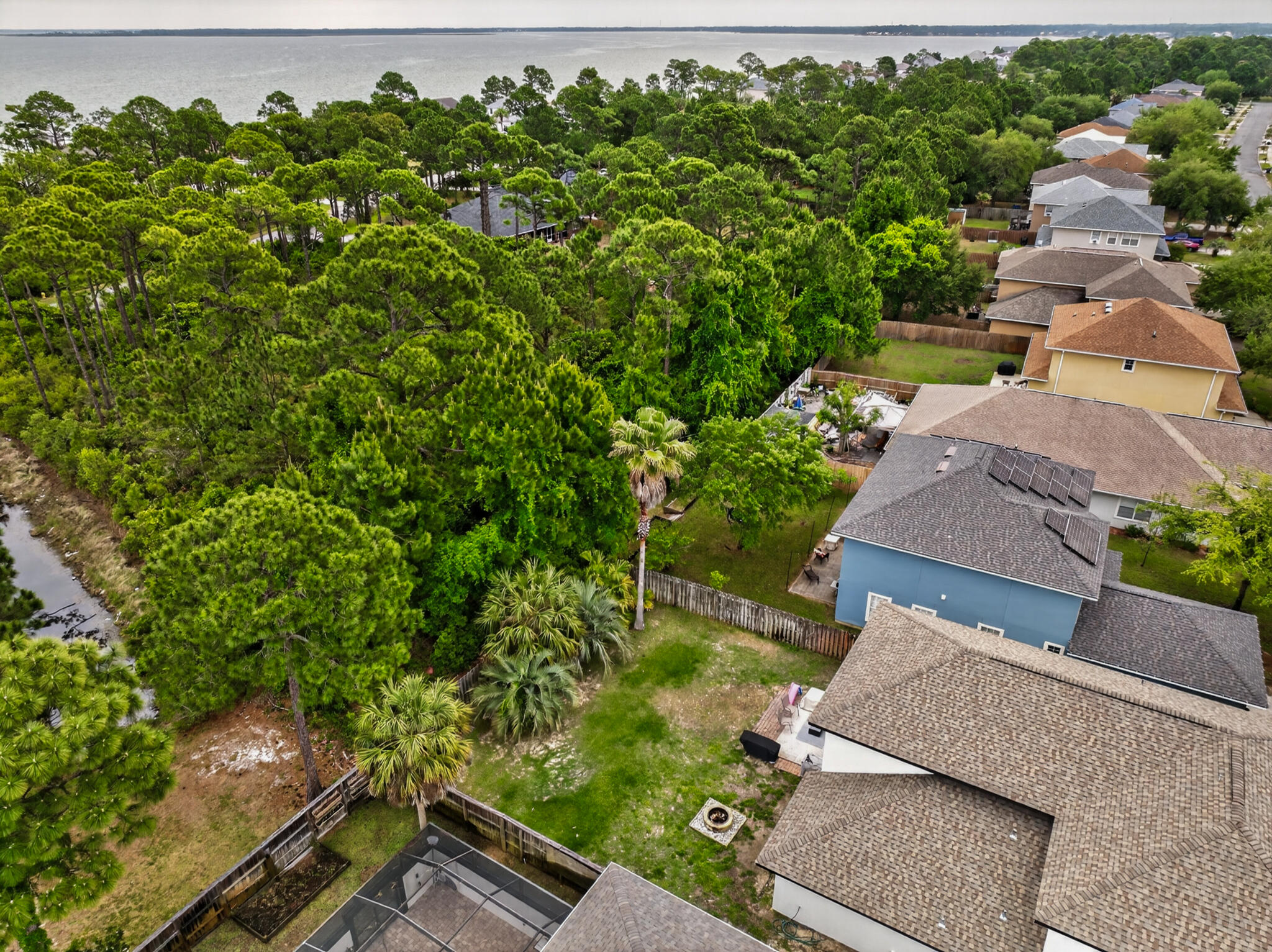 268 Loblolly Bay Drive Santa Rosa Beach, FL 32459 - Photo 23 of 73 an aerial view of a house with a yard basket ball court and outdoor seating