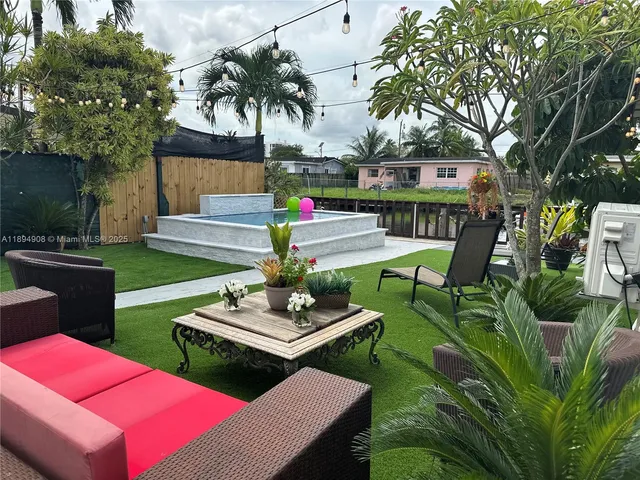 a view of an chairs and tables in the patio