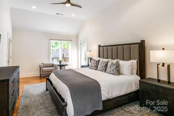 a bathroom with a double vanity sink toilet and shower