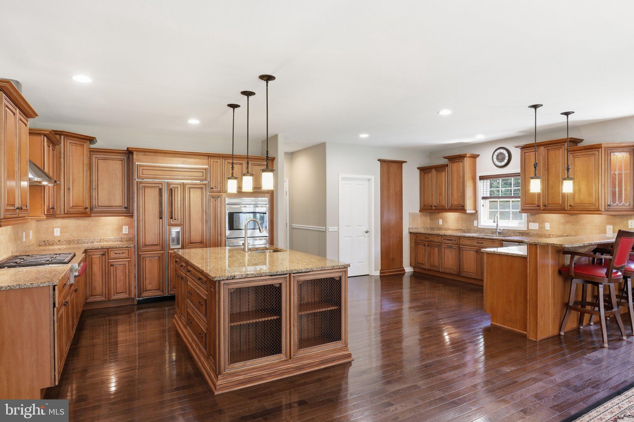 16932 Fitzgeralds Road Lincoln, DE 19960 - Photo 55 of 103 Elegant kitchen with rich wood finishes.