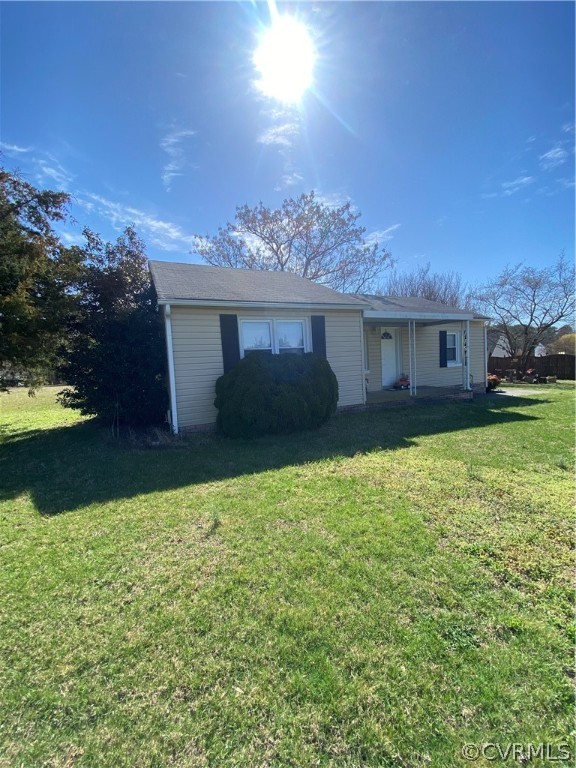 8220 Lee Davis Road Mechanicsville, VA 23111 - Photo 1 of 11 a view of a house with a yard and a garden