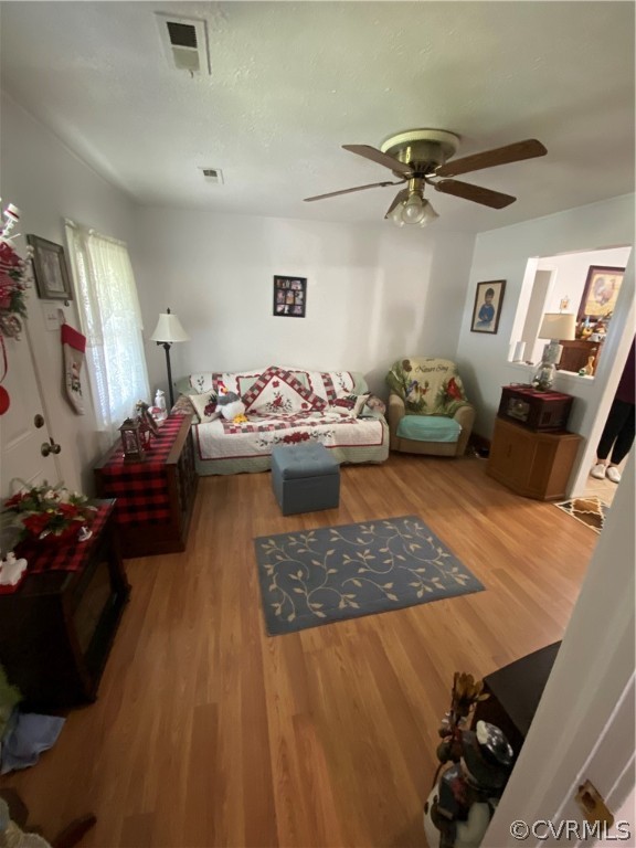 8220 Lee Davis Road Mechanicsville, VA 23111 - Photo 5 of 11 a living room with furniture and a wooden floor