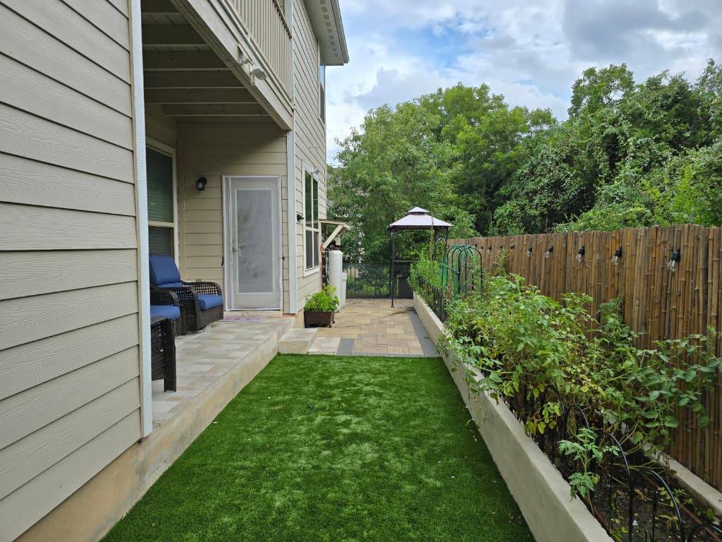 9713 McKnight Loop, Unit 34 Austin, TX 78717 - Photo 17 of 17 a view of a back yard of the house