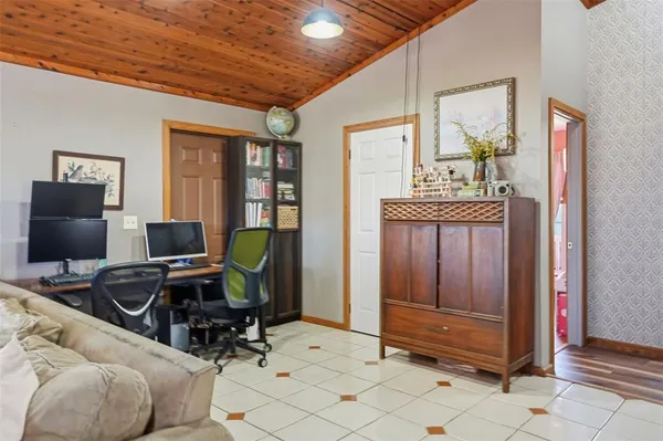 a workspace with furniture and a window