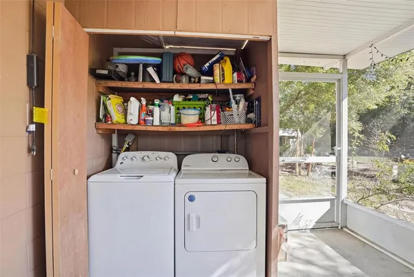 a utility room with dryer and washer