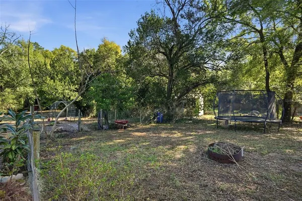 a fire hydrant in the middle of a field