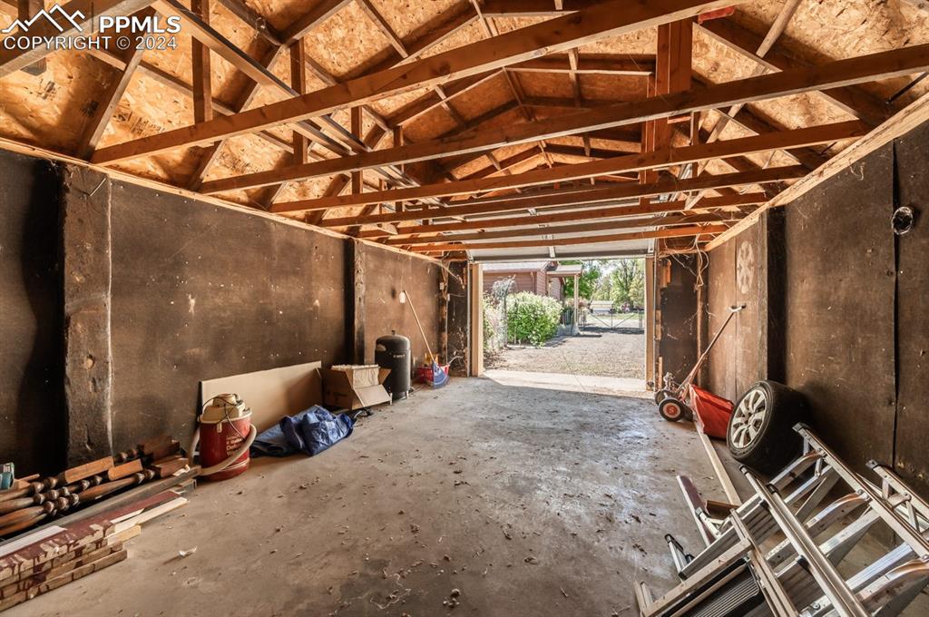 2233 Daniel Road Pueblo, CO 81006 - Photo 29 of 48 a view of a room with gym equipment and floor to ceiling window