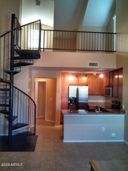 4081 East Windsor Drive Gilbert, AZ 85296 - Photo 4 of 8 a view of hall way with furniture