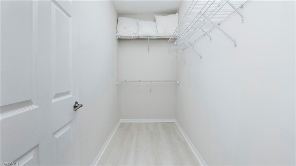 606 Arbor Lake Drive, Unit 6104 Naples, FL 34110 - Photo 16 of 36 a view of a small space