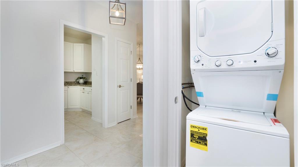 606 Arbor Lake Drive, Unit 6104 Naples, FL 34110 - Photo 19 of 36 a view of washer and dryer