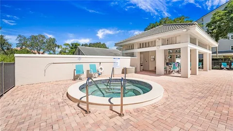 a front view of a house with swimming pool