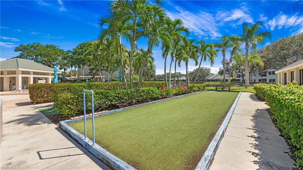 606 Arbor Lake Drive, Unit 6104 Naples, FL 34110 - Photo 35 of 36 a view of balcony with a garden and plants