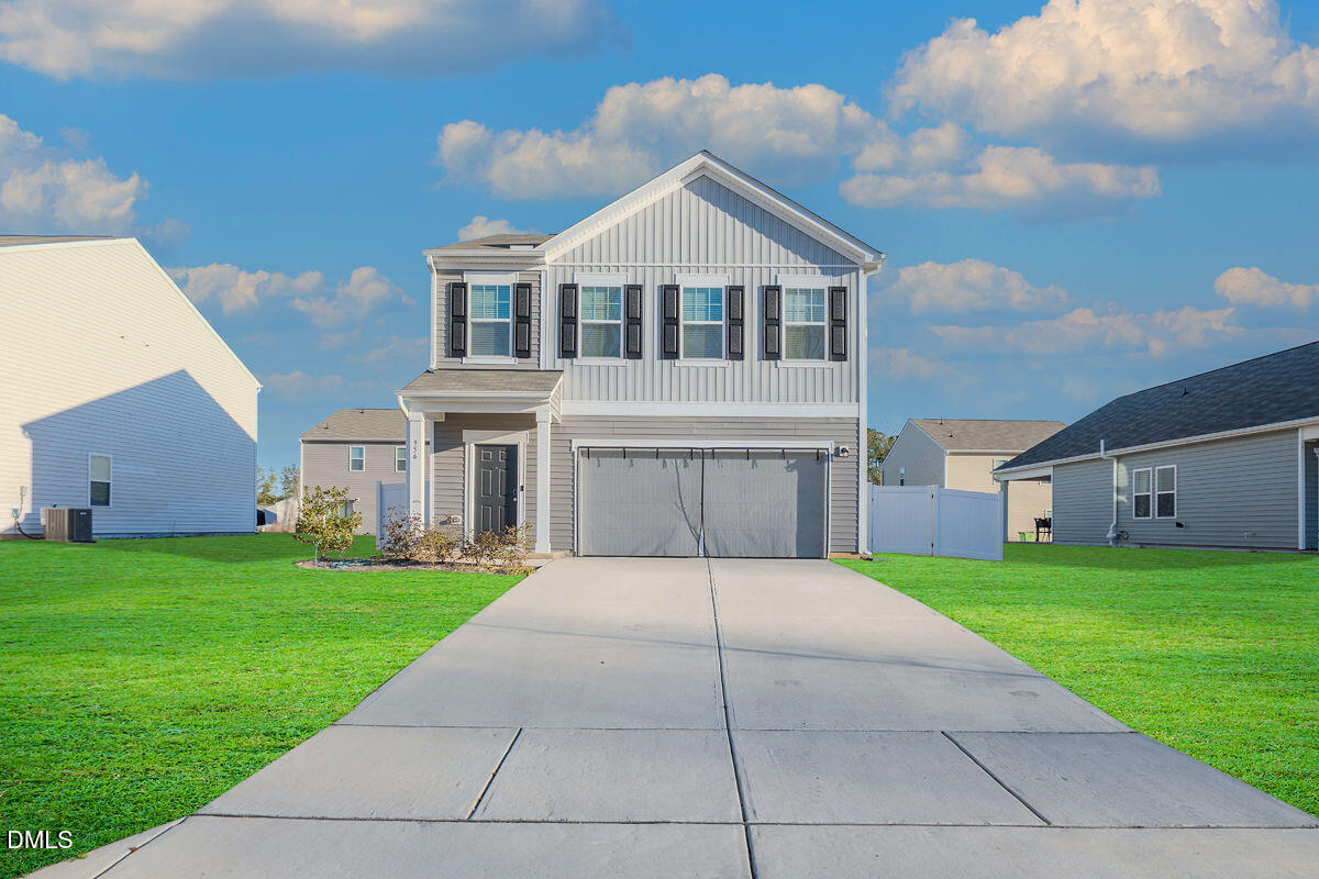 a front view of house with yard