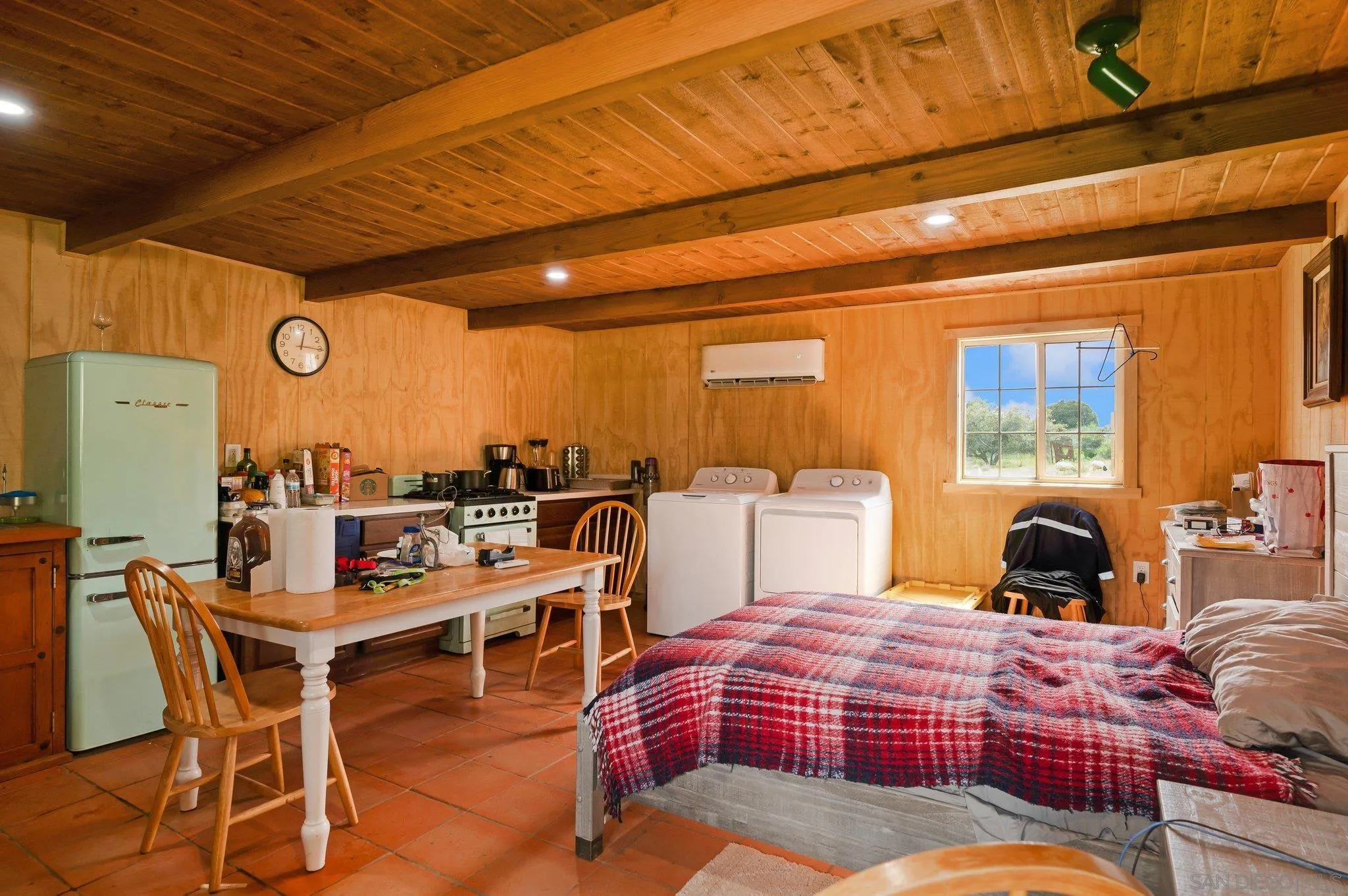 17287 Oak Hollow Road Ramona, CA 92065 - Photo 38 of 71 a bedroom with furniture and a large window