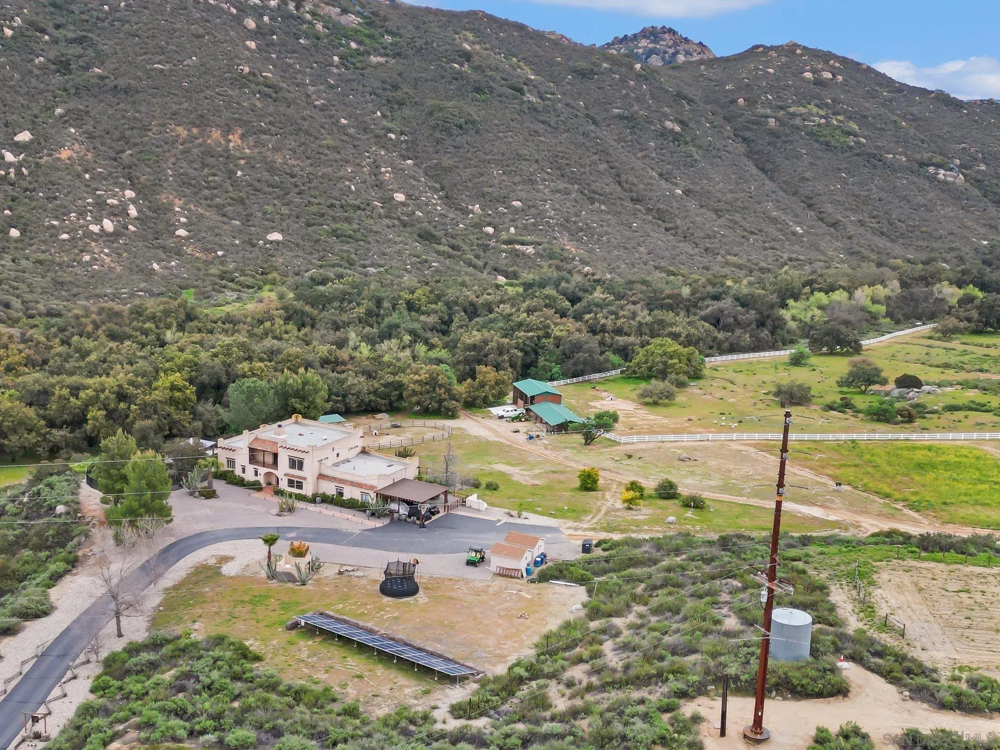 17287 Oak Hollow Road Ramona, CA 92065 - Photo 60 of 71 a view of a house with a yard