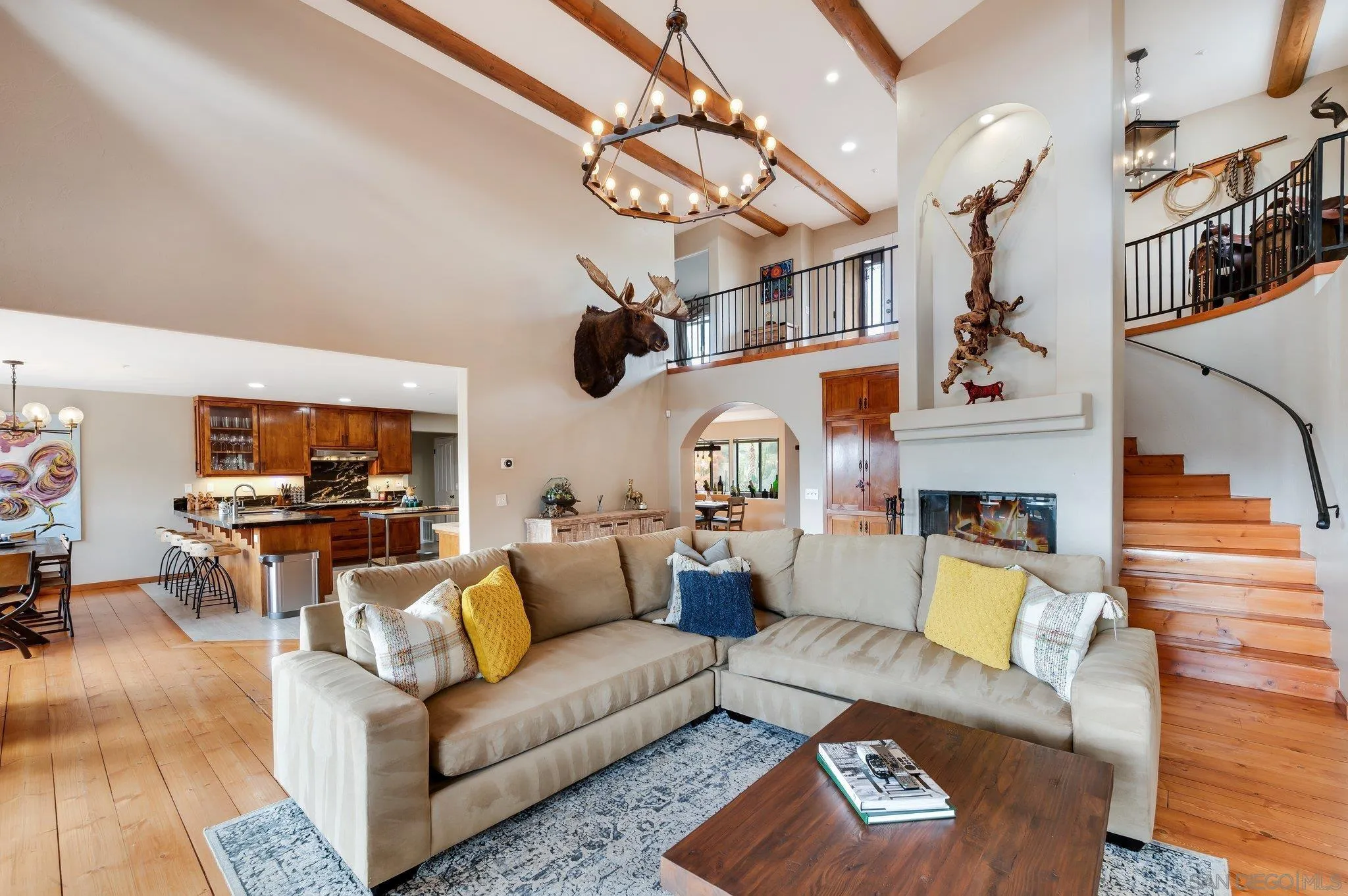 17287 Oak Hollow Road Ramona, CA 92065 - Photo 10 of 71 a living room with furniture and a fireplace