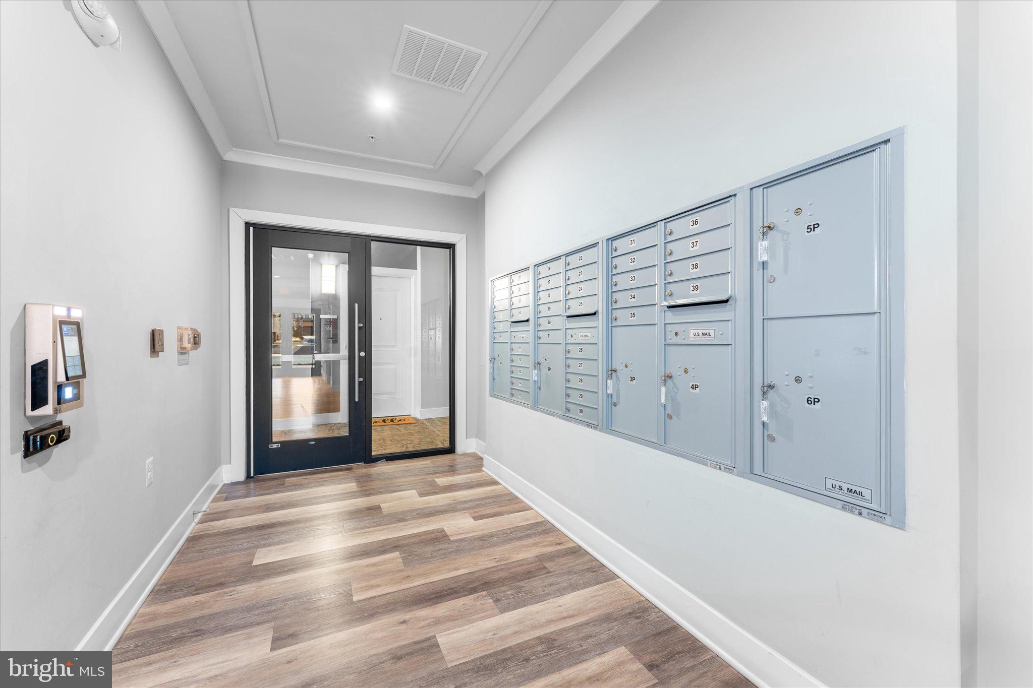1669 Bandit Loop, Unit 206A Reston, VA 20190 - Photo 26 of 60 a view of a hallway with closet area
