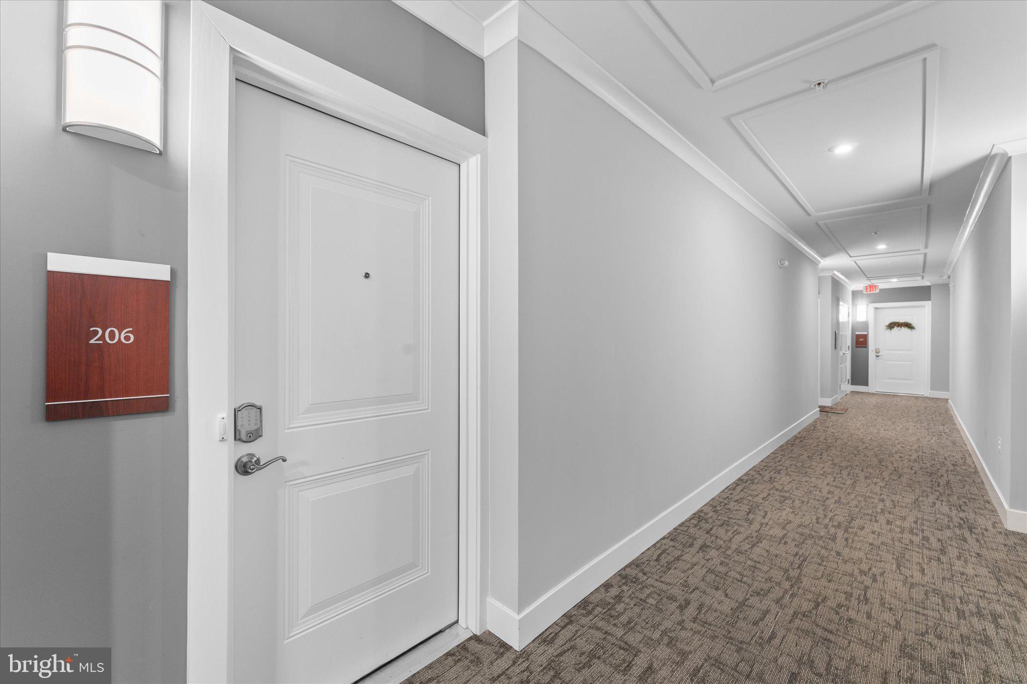 1669 Bandit Loop, Unit 206A Reston, VA 20190 - Photo 33 of 60 a view of a hallway