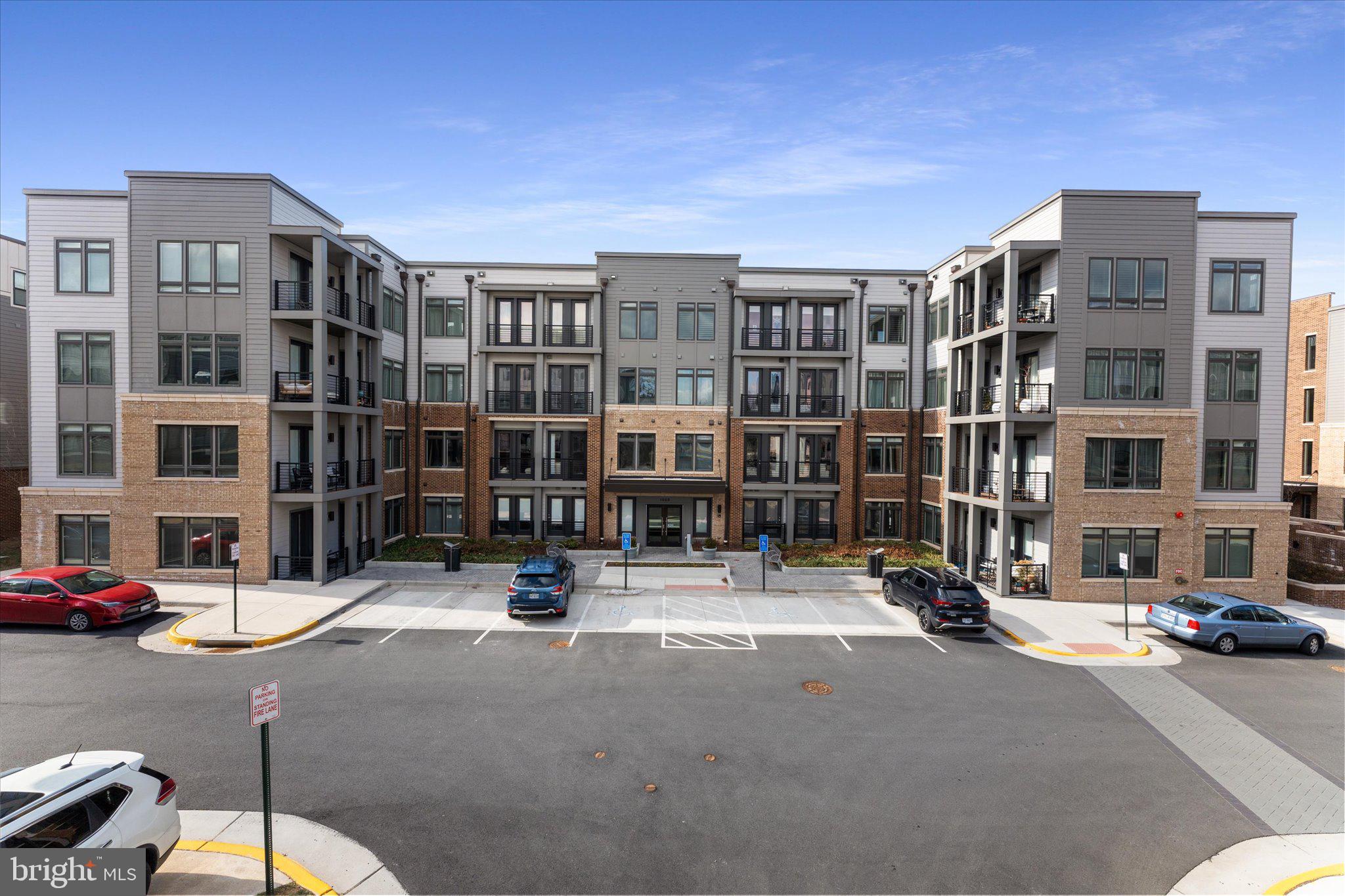 1669 Bandit Loop, Unit 206A Reston, VA 20190 - Photo 4 of 60 a front view of a building with street view