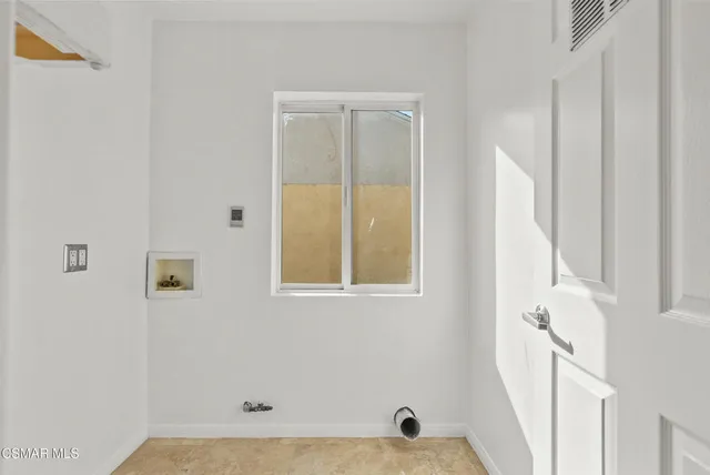 a view of an entryway with a window