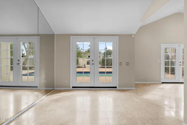 a view of a room with large window