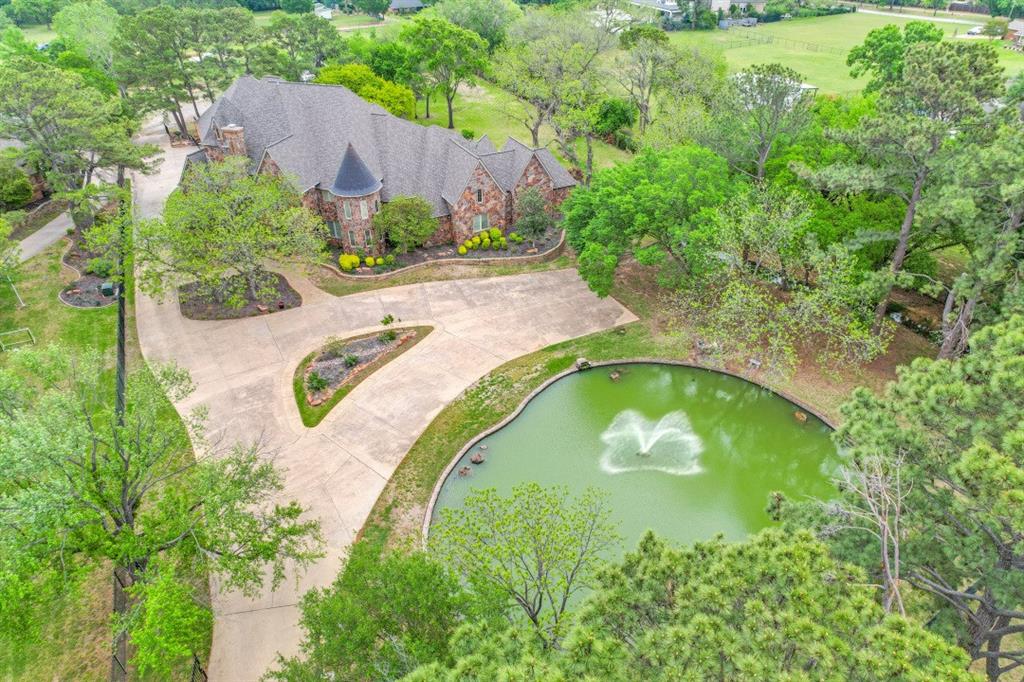 7212 John McCain Road Colleyville, TX 76034 - Photo 36 of 36 an aerial view of a swimming pool