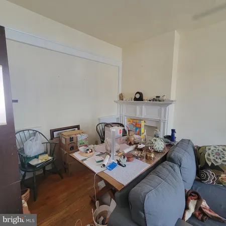 a view of a workspace with furniture