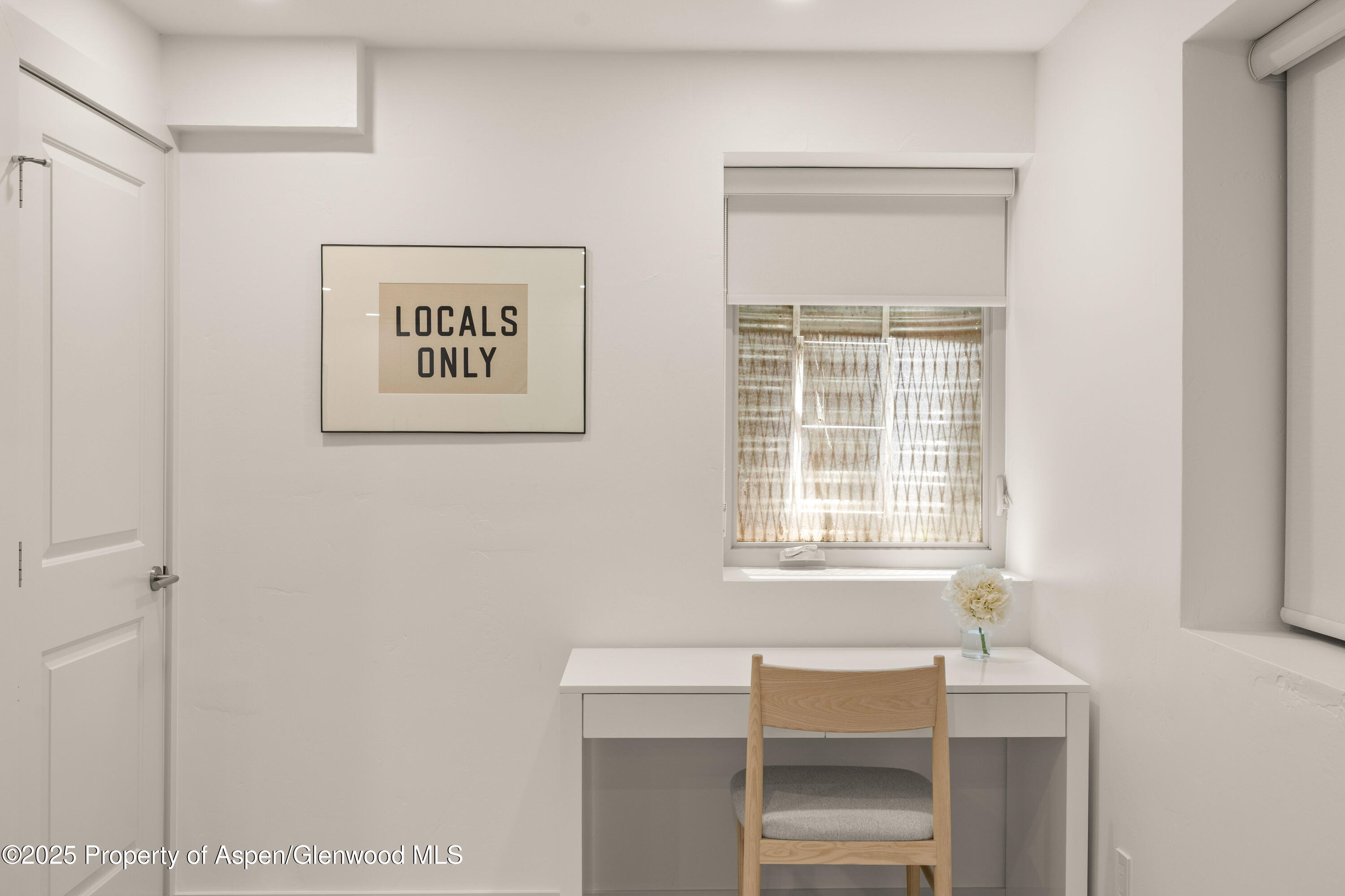 814 West Bleeker Street, Unit B2 Aspen, CO 81611 - Photo 14 of 17 a view of an empty room with a window