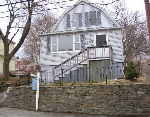 255 Dayton Road Bridgeport, CT 06606 - Photo 1 of 1 a front view of a house with a yard