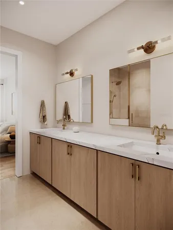 a bathroom with a double vanity sink and a mirror