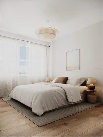 a bedroom with a bed and a cabinets