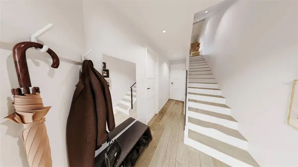 a view of a staircase and a floor to ceiling window