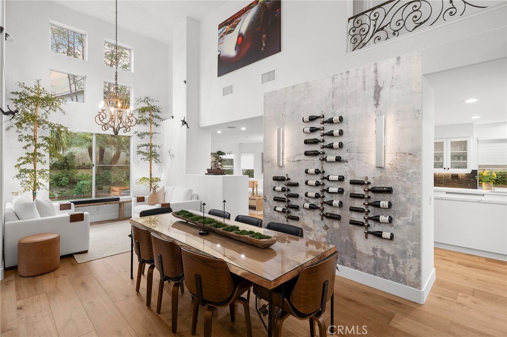 36 Regina Dana Point, CA 92629 - Photo 10 of 45 a room with a table chairs and a kitchen view