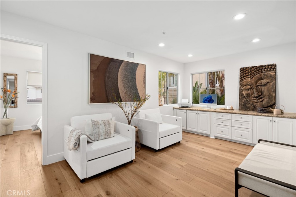 36 Regina Dana Point, CA 92629 - Photo 20 of 45 a living room with furniture and a flat screen tv