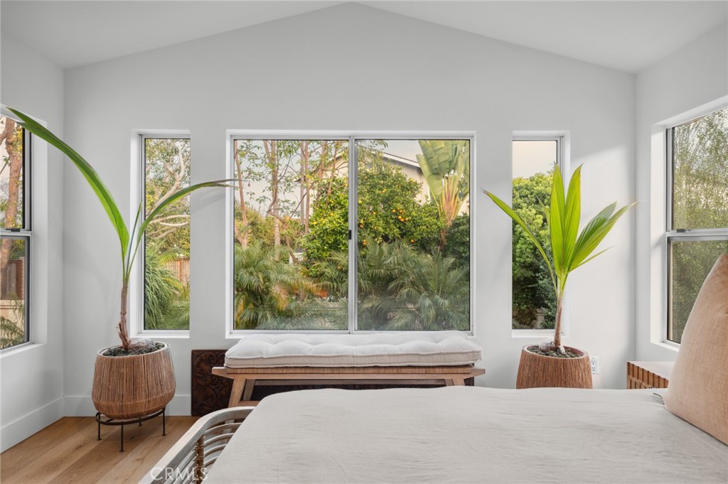 36 Regina Dana Point, CA 92629 - Photo 24 of 45 a bedroom with a large window and a bed