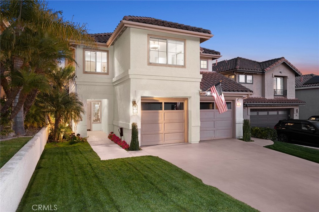 36 Regina Dana Point, CA 92629 - Photo 35 of 45 a view of an house with backyard and a tree