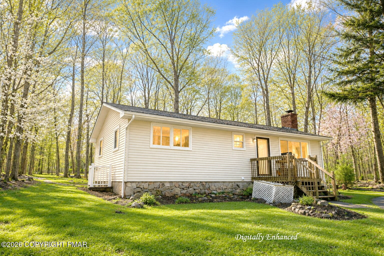 6319 Laurel Road Pocono Summit, PA 18346 - Photo 1 of 22 a view of backyard with a garden and trees
