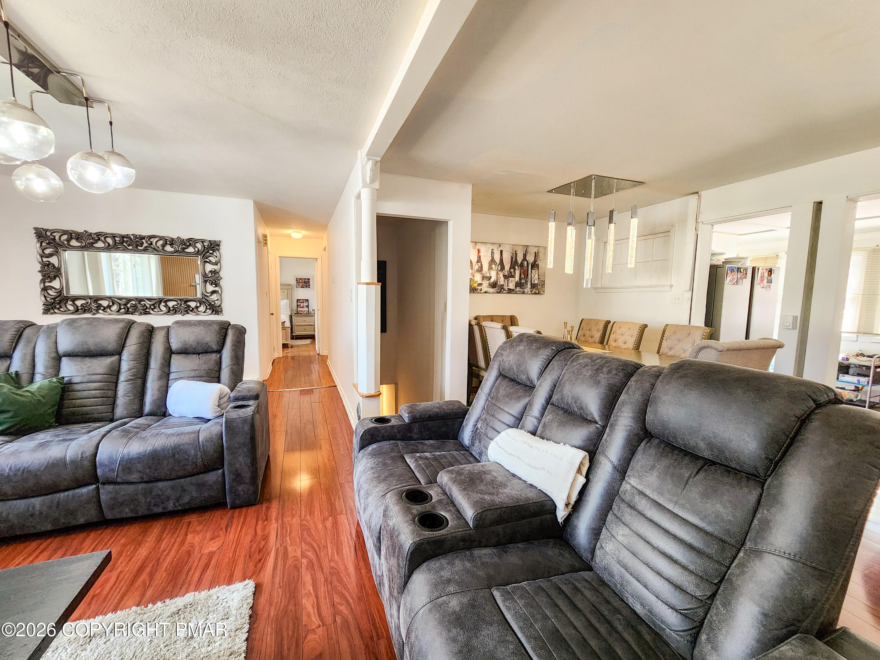 6319 Laurel Road Pocono Summit, PA 18346 - Photo 11 of 22 a living room with furniture and a couch