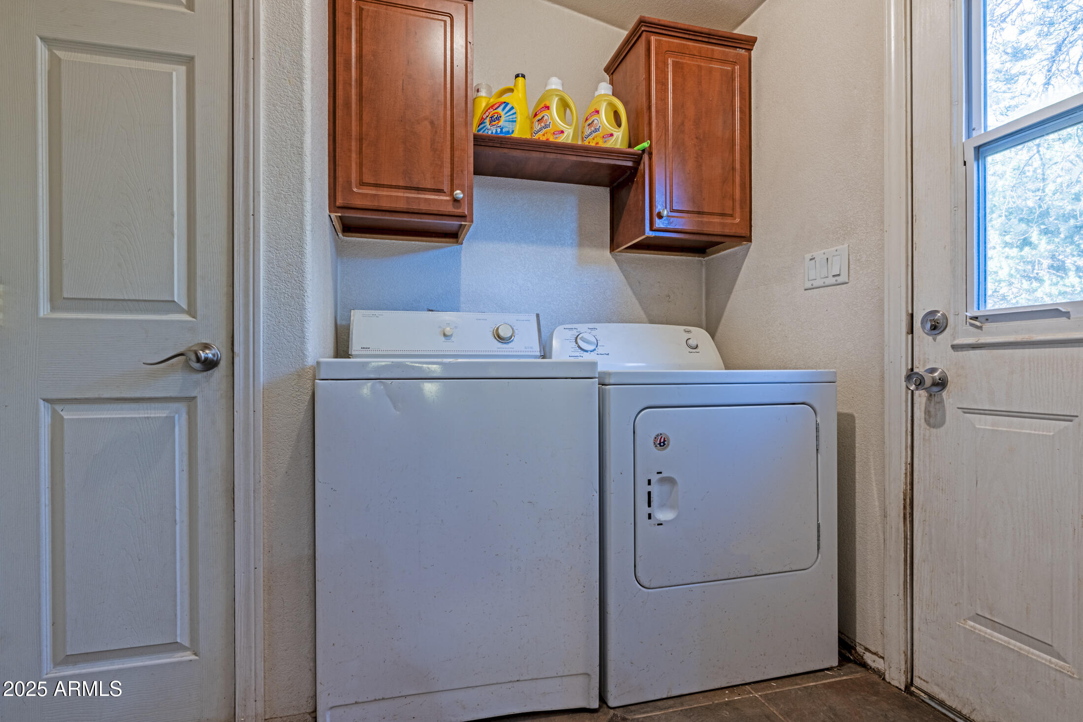2179 Hackamore Drive Overgaard, AZ 85933 - Photo 16 of 26 a utility room with dryer and washer
