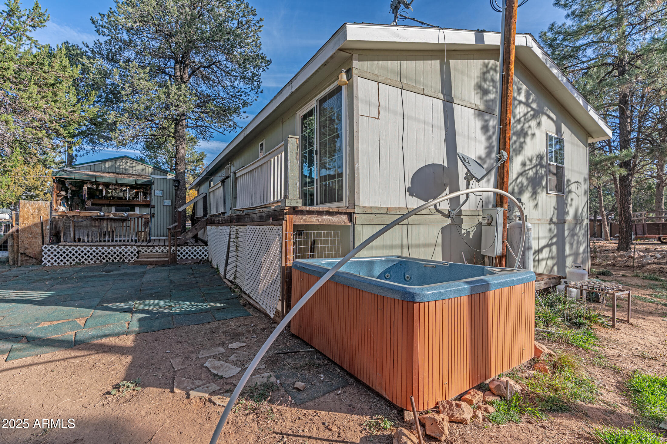 2179 Hackamore Drive Overgaard, AZ 85933 - Photo 23 of 26 a front view of house with street