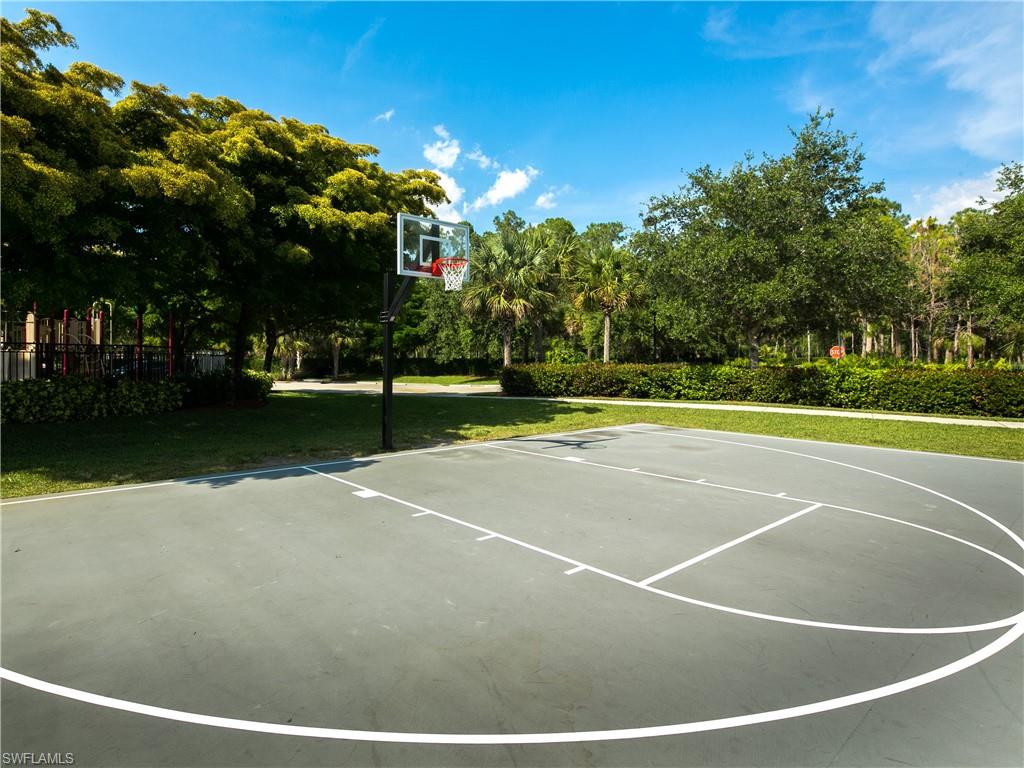 1638 Triangle Palm Terrace Naples, FL 34119 - Photo 29 of 30 a view of a tennis court