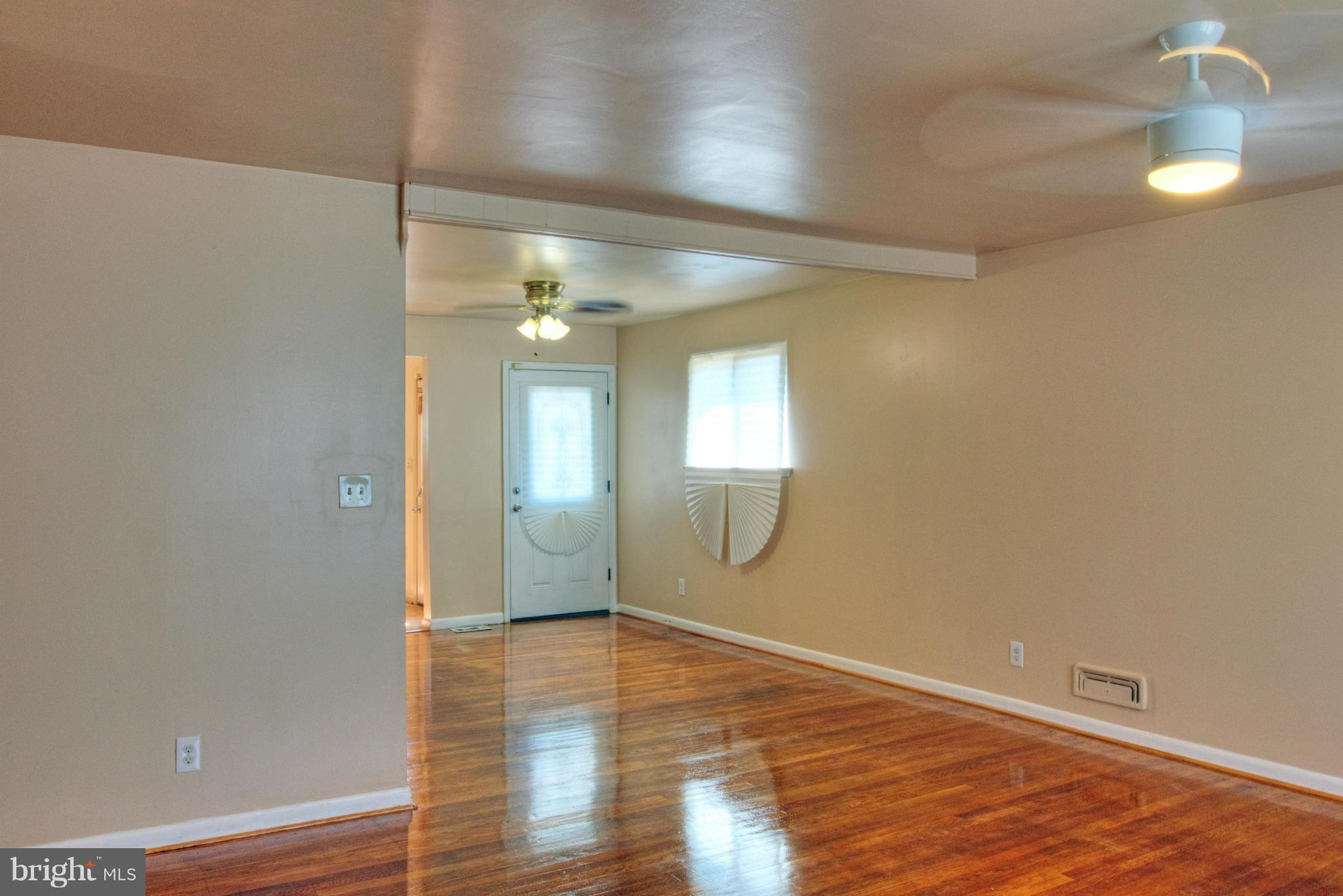 3705 Collier Road Randallstown, MD 21133 - Photo 4 of 30 wooden floor in an empty room