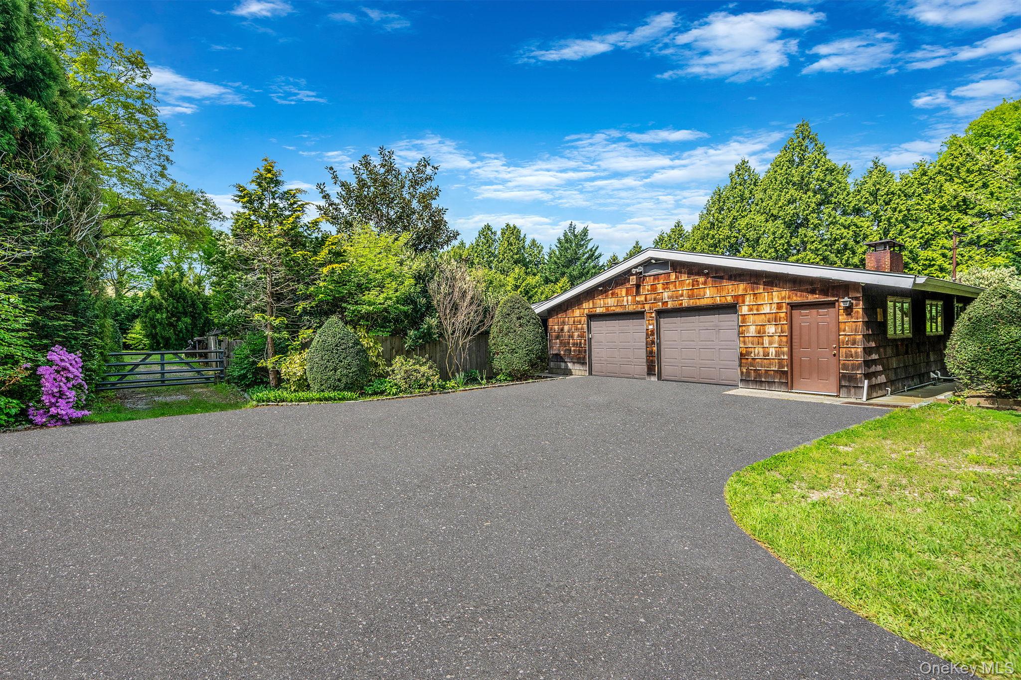 280 Deforest Road North Dix Hills, NY 11746 - Photo 9 of 37 a house view with a garden space