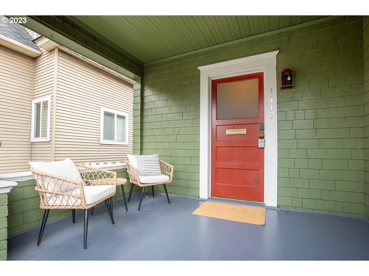 1410 Southeast 35th Avenue Portland, OR 97214 - Photo 2 of 39 a balcony with table and chairs