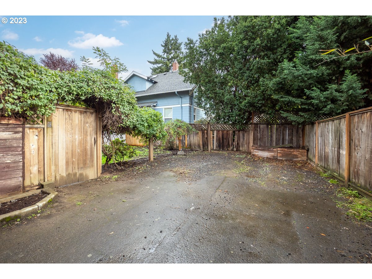 1410 Southeast 35th Avenue Portland, OR 97214 - Photo 38 of 39 a view of a house with a backyard