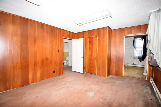 a view of a room with a flat screen tv