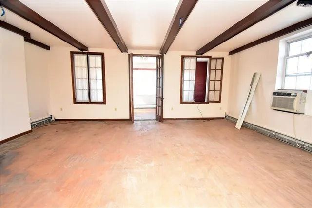 an empty room with windows