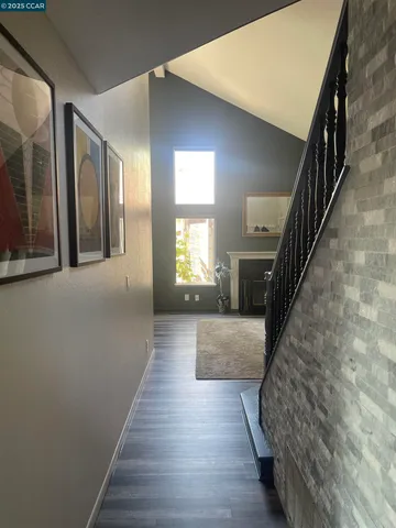 a view of a hallway with workspace